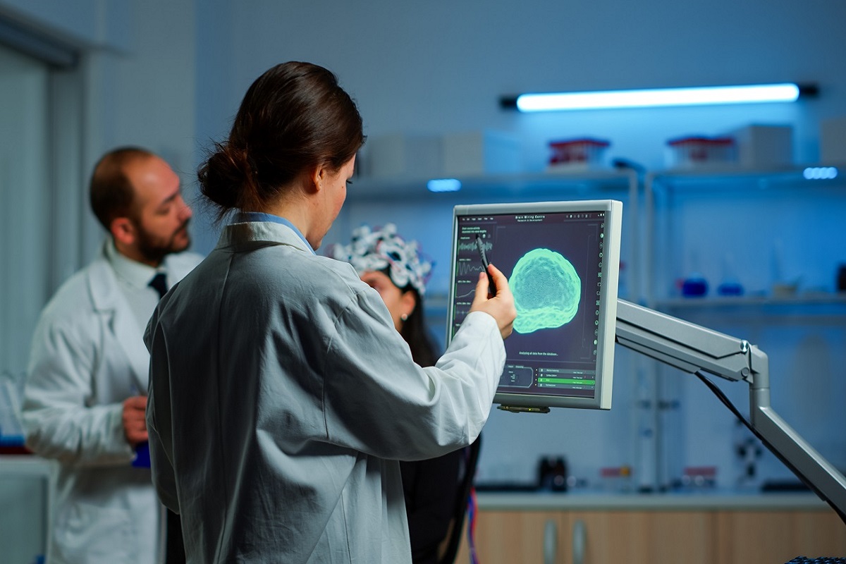 How long can CPR last before brain damage – doctor reviewing brain scan after resuscitation