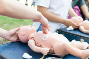 cpr cardiopulmonary resuscitation first aid class baby - Ileria CPR Feedback training technology