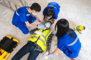 first aid head injuries considered all trauma incidents worker work first aid training transfer patient loss feeling loss normal movement 1 - Ileria CPR Feedback training technology