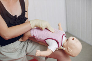 Administering CPR compressions for a child