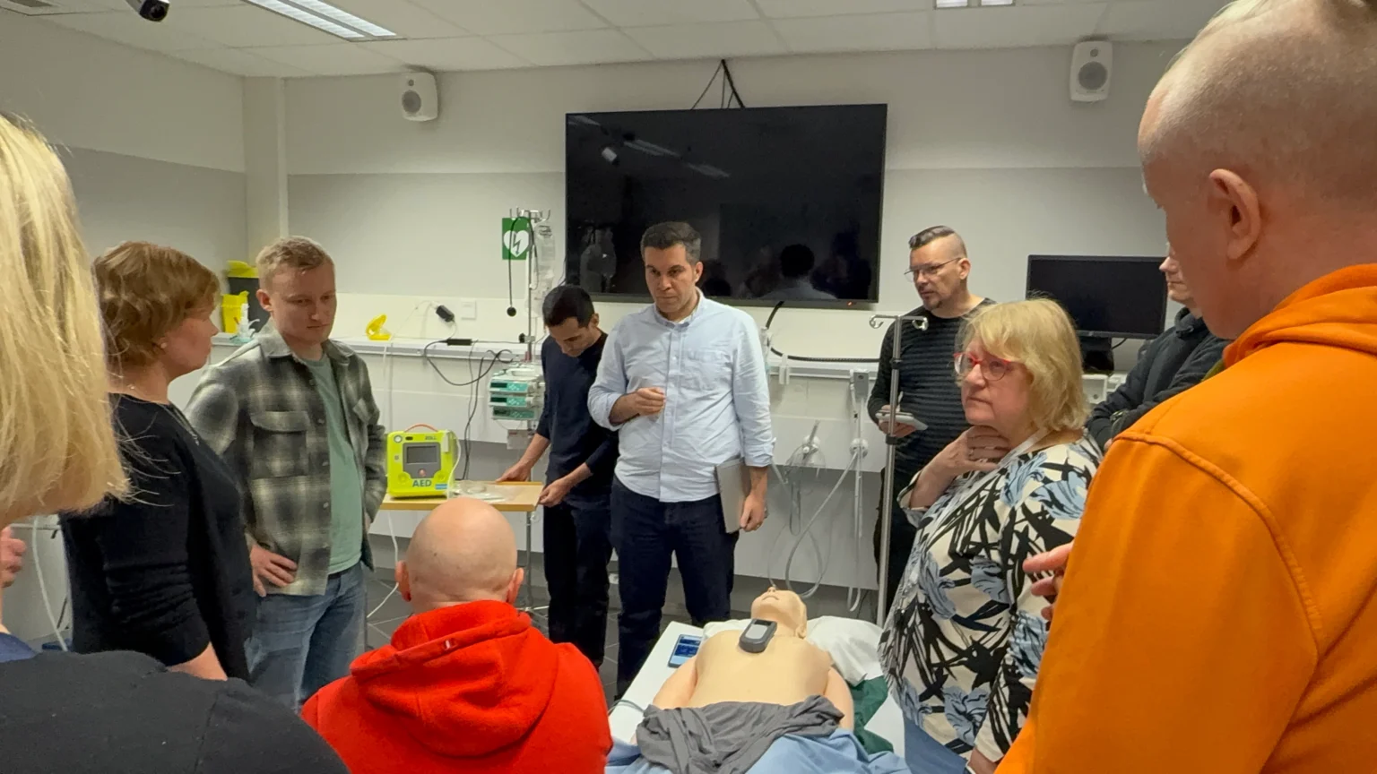 Clinical education team discussing the Ileria CPR feedback device after testing